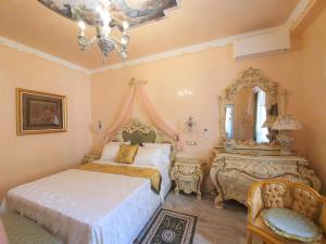 Postel nebo postele na pokoji v ubytování FD Luxury rooms