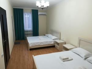 Letto o letti in una camera di West House