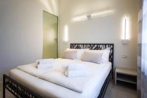 A bed or beds in a room at Borgocinquanta