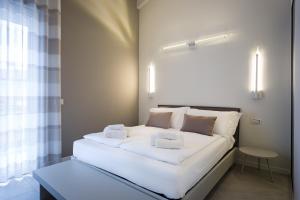 A bed or beds in a room at Borgocinquanta