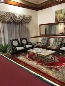 Predel za sedenje v nastanitvi Rayon Hotel