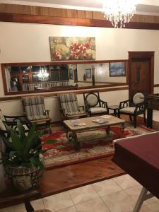 Predel za sedenje v nastanitvi Rayon Hotel