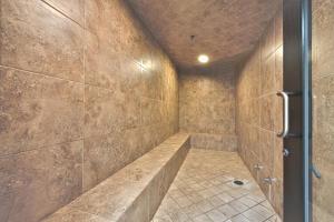 a large shower with a bench in a room at Silverado Lodge Two Queen Hotel Room by Canyons Village Rentals 223C in Park City
