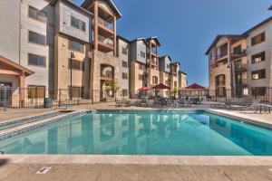 an image of a swimming pool at a apartment complex at Silverado Lodge Two Queen Hotel Room by Canyons Village Rentals 223C in Park City