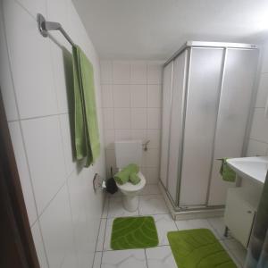 Koupelna v ubytování Buongustaio1 Zimmer mit ensuite T&B