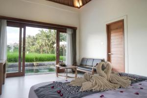 Katil atau katil-katil dalam bilik di Masia Villa Ubud +109 gambar