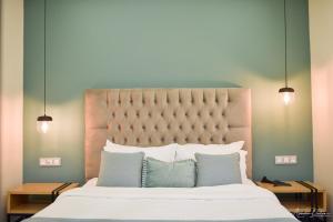 Postel nebo postele na pokoji v ubytování Thalassa Apart Hotel