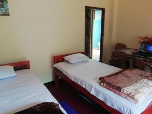 Cama o camas de una habitación en Hello Super Hostel