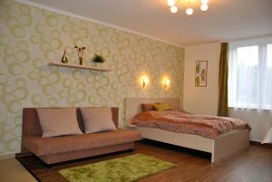 Posteľ alebo postele v izbe v ubytovaní Gyula Vár Prémium Apartman
