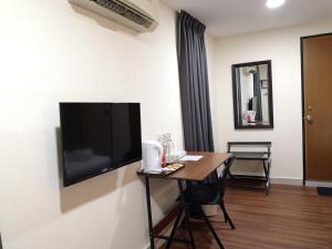 TV a/nebo společenská místnost v ubytování Hotel Sunjoy9 OKR