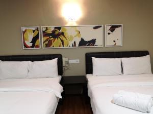Postel nebo postele na pokoji v ubytování Hotel Sunjoy9 OKR