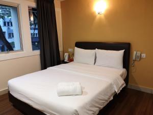 Postel nebo postele na pokoji v ubytování Hotel Sunjoy9 OKR