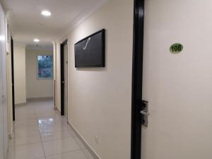 TV a/nebo společenská místnost v ubytování Hotel Sunjoy9 OKR