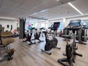 a gym with a bunch of exercise bikes in it at Gothia Towers in Gothenburg