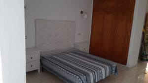 Säng eller sängar i ett rum på Apartamento en Caleta Paraíso.