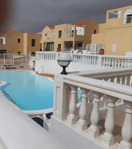 a view of a balcony with a swimming pool at Apartamento en Caleta Paraíso. in Costa de Antigua