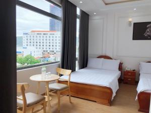 Voodi või voodid majutusasutuse HẢI PHƯƠNG Hotel toas