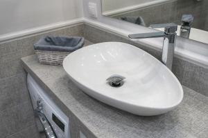 Kúpeľňa v ubytovaní AMN APARTMENTS
