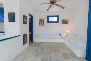 Posteľ alebo postele v izbe v ubytovaní Villa Arios, pool, jacuzzi and sea