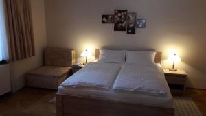 Posteľ alebo postele v izbe v ubytovaní Szalay Villa