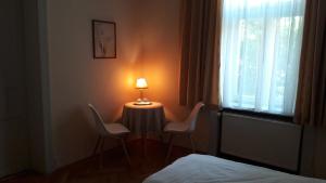 Posteľ alebo postele v izbe v ubytovaní Szalay Villa