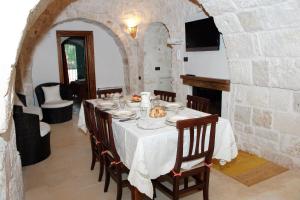 Posezení v ubytování Trulli Boccadoro