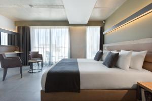 Azur Hotel by ST Hotels客房内的一张或多张床位