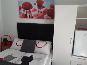 Posteľ alebo postele v izbe v ubytovaní Szalay Villa