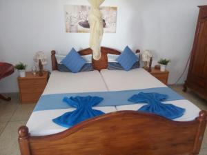 Postel nebo postele na pokoji v ubytování Embiente Guest House
