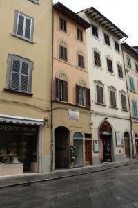 a group of buildings on a city street at Appartamento Cilembrini in Montevarchi