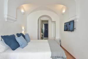 Posteľ alebo postele v izbe v ubytovaní Casa Amorino