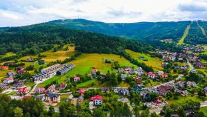 an aerial view of a small village in the mountains at Apartament Salmopolska5 in Szczyrk