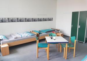 Postel nebo postele na pokoji v ubytování Hostel jo-si + 10 fotografií