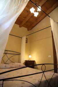 A bed or beds in a room at A Cà Du Barbijun