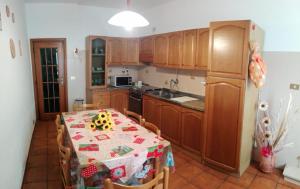 A kitchen or kitchenette at A Casa Mia