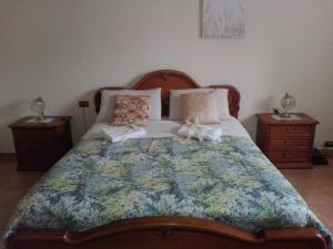 A bed or beds in a room at A Casa Mia