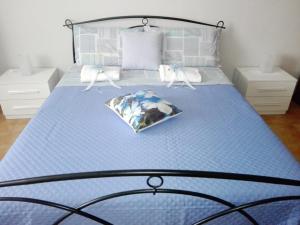 A bed or beds in a room at A Casa Mia