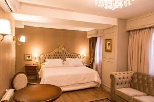 Llit o llits en una habitació de Hotel Daara