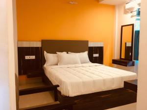 Postel nebo postele na pokoji v ubytování MM Park Inn