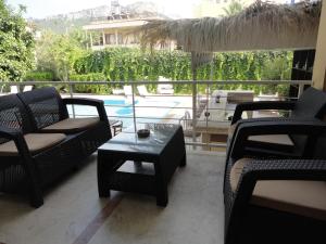 Bazén v ubytování Tuncer Garden Hotel nebo v jeho okolí