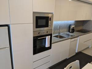 Apartamento em Monsanto - Porto tesisinde mutfak veya mini mutfak
