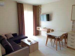 TV a/nebo společenská místnost v ubytování APARTMENTS TOMIĆ