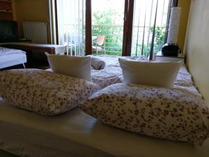 Postel nebo postele na pokoji v ubytování Mandarin Wellness Apartman
