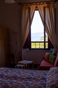 Un pat sau paturi într-o cameră la Albergo Pensione Bartoli