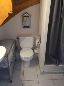 Vonios kambarys apgyvendinimo įstaigoje Petit havre de paix