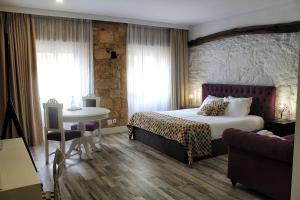 Letto o letti in una camera di Art'Otel Barcelos