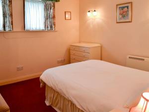 A bed or beds in a room at Gull'S Crest 