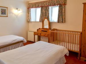 A bed or beds in a room at Gull'S Crest 