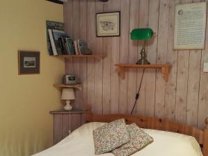 A bed or beds in a room at St Robert'S Chantry 