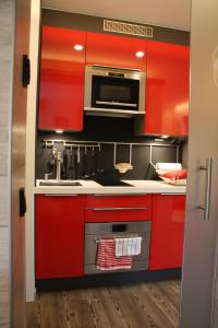Kuchyň nebo kuchyňský kout v ubytování Design-Appartement Jochberg